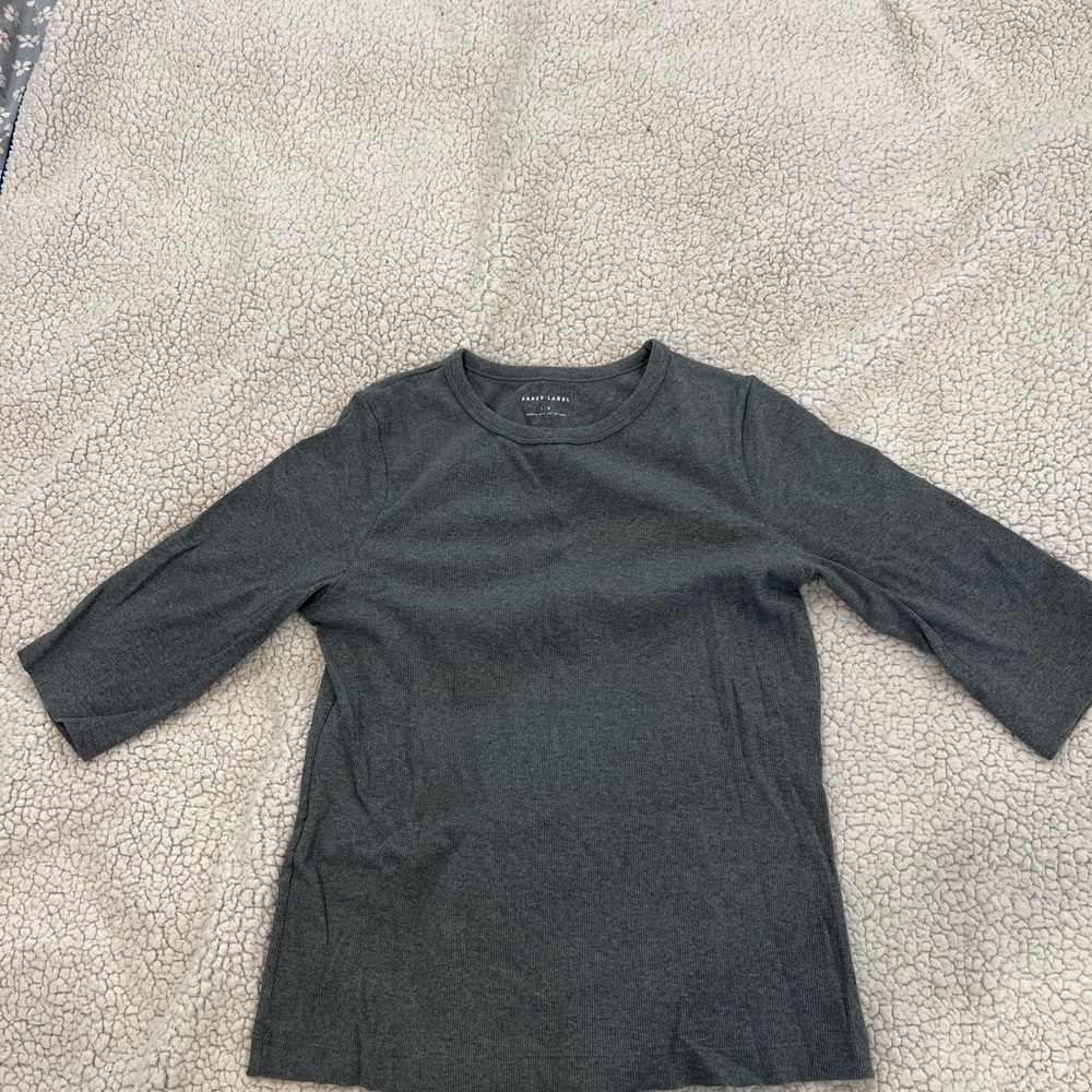Like new. Paper label, grey, 3/4 sleeve semi fitted knit top.